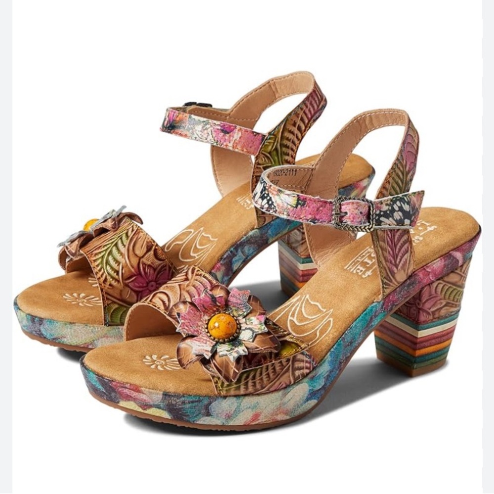 Multiple colors. 3 in heel. Excellent condition. Worn once. Sz 37.